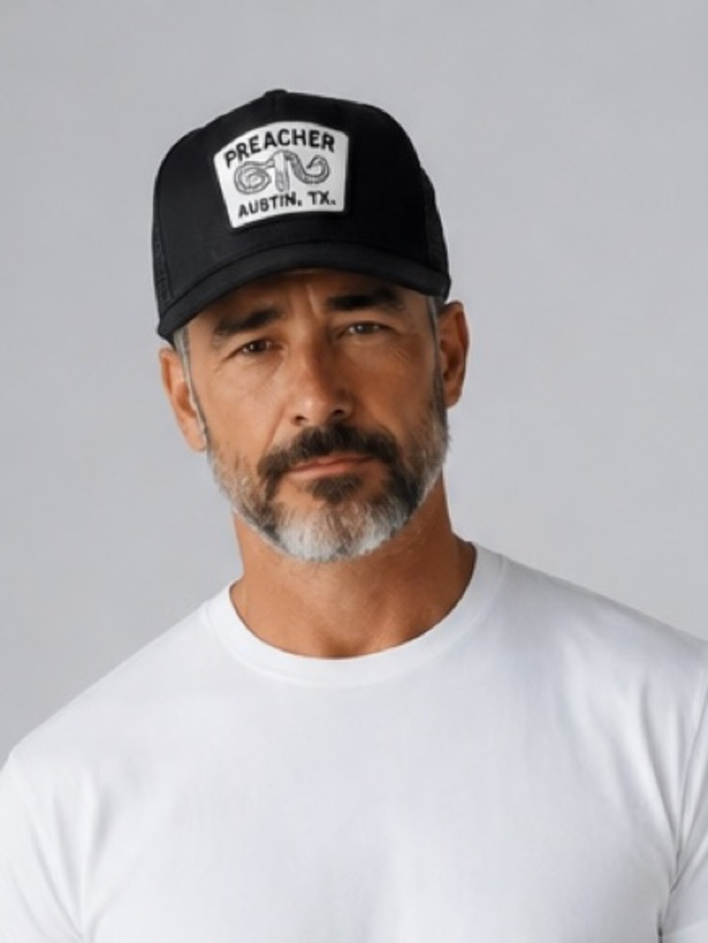 Preacher Austin TX Black Patch Trucker Hat